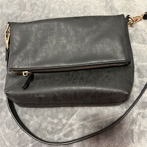 Black distressed look handbag